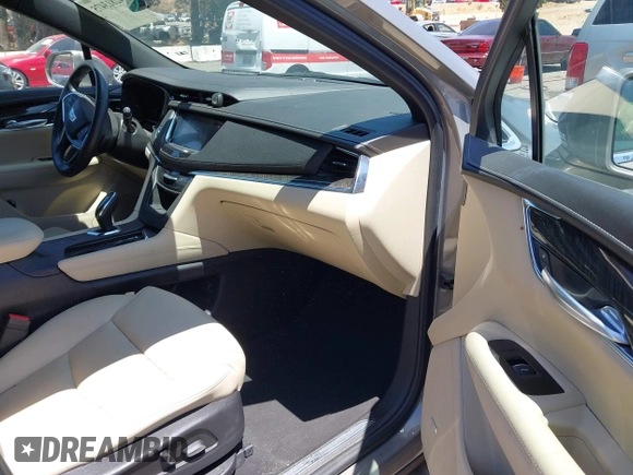 2018 Cadillac XT5 FWD with VIN 1GYKNARS5JZ242794, listed as a IAAI auction lot 42813475 with 32,266 mi miles and . Bid and sale history available at DreamBid. Image 5.