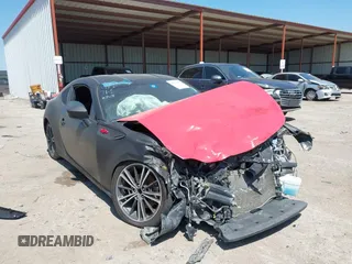 2014 Scion FR-S z VIN JF1ZNAA12E8705290, wystawiony jako IAAI lot #41974597 z przebiegiem 128 933 mil mil oraz . Historia ofert i sprzedaży dostępna na DreamBid. Obrazek 1.