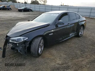 2015 BMW 5 Series 550i z VIN WBAKN9C5XFD961497, wystawiony jako Copart lot #79321104 z przebiegiem Nie podano mil oraz Szkoda całkowita • Salvage title. Historia ofert i sprzedaży dostępna na DreamBid. Obrazek 1.