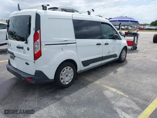 2014 Ford Transit Connect XLT with VIN NM0LS7F79E1140809, listed as a IAAI auction lot 42006811 with 183,152 mi miles. Bid and sale history available at carsss.com. Image 4.