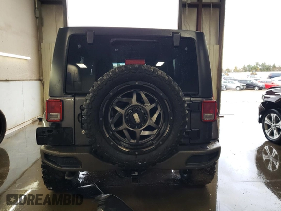 2016 Jeep Wrangler Unlimited 75th Anniversary with VIN 1C4BJWEG4GL254043, listed as a Copart auction lot 78647314 with 102,155 mi miles and Salvage title. Bid and sale history available at DreamBid. Image 6.