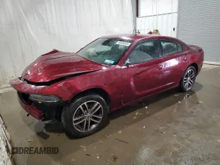 2019 Dodge Charger SXT with VIN 2C3CDXJGXKH534504, listed as a Copart auction lot 69496054 with 59,810 mi miles and Salvage Title. Bid and sale history available at DreamBid. Image 1.