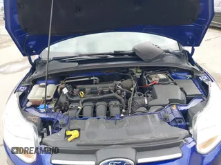 2014 Ford Focus SE with VIN 1FADP3F21EL314534, listed as a IAAI auction lot 42130032 with 103,866 mi miles. Bid and sale history available at carsss.com. Image 10.