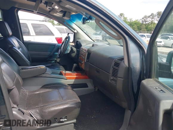 2007 Nissan Titan LE with VIN 1N6BA06A57N200128, listed as a IAAI auction lot 42223329 with 200,066 mi miles and . Bid and sale history available at DreamBid. Image 5.