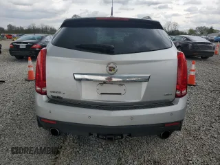 2013 Cadillac SRX Performance Collection z VIN 3GYFNHE3XDS622157, wystawiony jako Copart lot #53475675 z przebiegiem 95 253 mil mil oraz Szkoda całkowita • Salvage title. Historia ofert i sprzedaży dostępna na DreamBid. Obrazek 6.