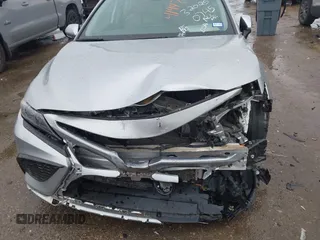 2022 Toyota Camry SE with VIN 4T1G11AKXNU697576, listed as a IAAI auction lot 41947082 with 67,199 mi miles and . Bid and sale history available at DreamBid. Image 6.