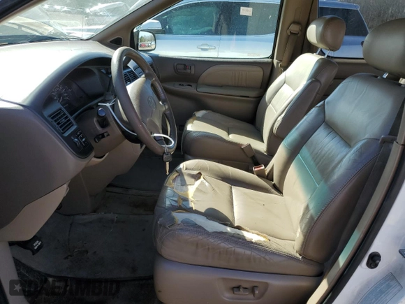1999 Toyota Sienna LE with VIN 4T3ZF13C0XU144476, listed as a Copart auction lot 48185235 with 183,940 mi miles and Salvage title. Bid and sale history available at DreamBid. Image 7.