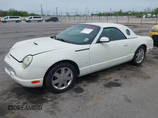 2003 Ford Thunderbird Deluxe with VIN 1FAHP60A03Y113355, listed as a IAAI auction lot 41890414 with 147,620 mi miles. Bid and sale history available at carsss.com. Image 14.