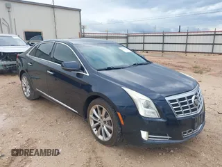 2013 Cadillac XTS Luxury with VIN 2G61P5S39D9182526, listed as a IAAI auction lot 42183995 with 132,778 mi miles. Bid and sale history available at carsss.com. Image 1.