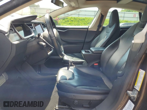 2014 Tesla Model S 60 with VIN 5YJSA1H17EFP31977, listed as a Copart auction lot 62521525 with Not provided miles and Clean title. Bid and sale history available at DreamBid. Image 7.