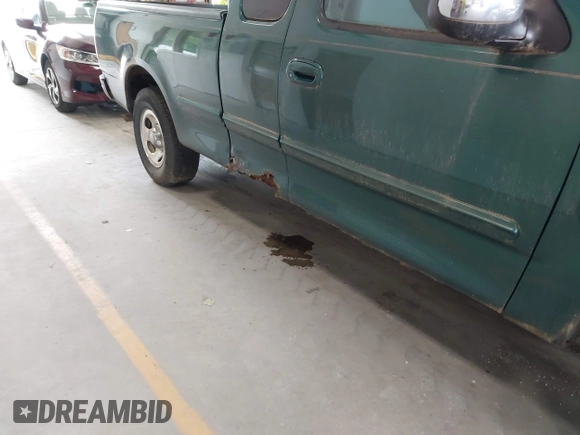 1999 Ford F-150 with VIN 1FTZX1729XNA06022, listed as a IAAI auction lot 42575958 with Not provided miles and . Bid and sale history available at DreamBid. Image 12.