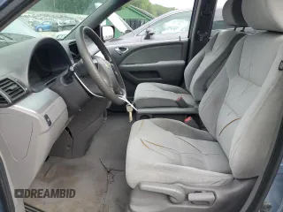 2010 Honda Odyssey LX with VIN 5FNRL3H29AB005111, listed as a Copart auction lot 65005735 with Not provided miles and Clean title. Bid and sale history available at DreamBid. Image 7.