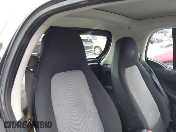 2013 Smart fortwo Pure with VIN WMEEJ3BA1DK651627, listed as a IAAI auction lot 42733791 with 130,561 mi miles and . Bid and sale history available at DreamBid. Image 8.