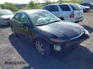 2004 Acura TSX w/Navigation with VIN JH4CL969X4C000525, listed as a IAAI auction lot 42143344 with 168,845 mi miles and . Bid and sale history available at DreamBid. Image 1.