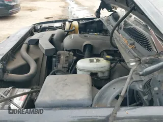 2003 Chevrolet Tahoe LS z VIN 1GNEC13T73R166712, wystawiony jako IAAI lot #43251150 z przebiegiem 243 592 mil mil oraz . Historia ofert i sprzedaży dostępna na DreamBid. Obrazek 12.