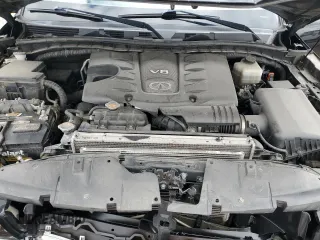 2012 Infiniti QX56 7-passenger z VIN JN8AZ2NE5C9021621, wystawiony jako Copart lot #53484825 z przebiegiem 139 453 mil mil oraz Szkoda całkowita • Salvage title. Historia ofert i sprzedaży dostępna na DreamBid. Obrazek 12.