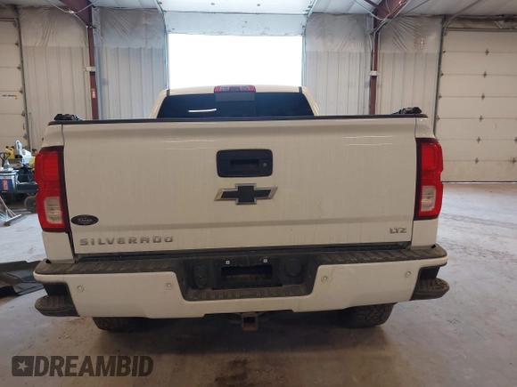 2016 Chevrolet Silverado 1500 LTZ with VIN 1GCVKSECXGZ329535, listed as a IAAI auction lot 41780464 with 117,901 mi miles and . Bid and sale history available at DreamBid. Image 16.