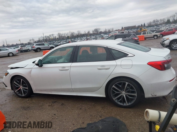 2023 Honda Civic Touring z VIN 2HGFE1F93PH304731, wystawiony jako IAAI lot #41675935 z przebiegiem 27 435 mil mil oraz . Historia ofert i sprzedaży dostępna na DreamBid. Obrazek 14.