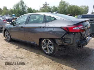 2018 Honda Clarity with VIN JHMZC5F12JC013732, listed as a IAAI auction lot 42157758 with 162,470 mi miles. Bid and sale history available at carsss.com. Image 3.