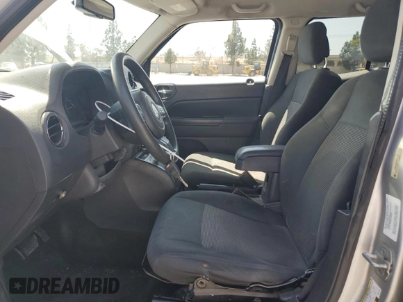 2014 Jeep Patriot Sport with VIN 1C4NJPBB1ED512442, listed as a Copart auction lot 61415565 with 211,715 mi miles and Salvage title. Bid and sale history available at DreamBid. Image 7.