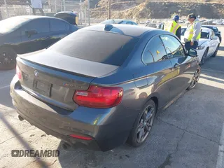 2016 BMW 2 Series M235i with VIN WBA1J7C53GV360553, listed as a IAAI auction lot 41561144 with 1 mi miles. Bid and sale history available at carsss.com. Image 4.