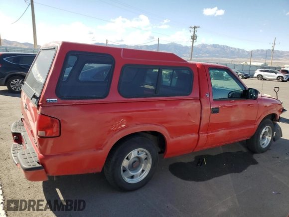 2000 GMC Sonoma SL z VIN 1GTCS145XYK251238, wystawiony jako Copart lot #77899534 z przebiegiem 61 827 mil mil oraz Szkody całkowita. Historia ofert i sprzedaży dostępna na DreamBid. Obrazek 3.