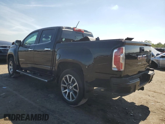 2021 GMC Canyon 4WD Denali with VIN 1GTG6EEN9M1255163, listed as a Copart auction lot 59868834 with 63,853 mi miles and Salvage Title. Bid and sale history available at carsss.com. Image 2.