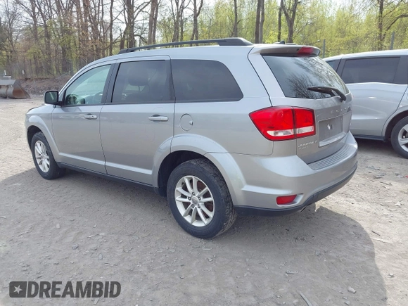 2015 Dodge Journey SXT with VIN 3C4PDDBG4FT554643, listed as a IAAI auction lot 42172378 with 144,924 mi miles and . Bid and sale history available at DreamBid. Image 3.