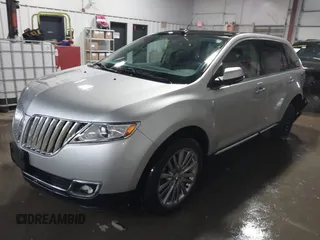 2014 Lincoln MKX with VIN 2LMDJ8JK7EBL16661, listed as a IAAI auction lot 41595967 with 77,868 mi miles. Bid and sale history available at carsss.com. Image 19.