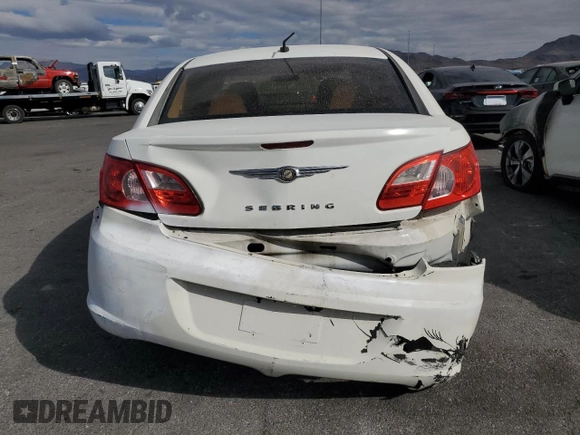 2008 Chrysler Sebring LX z VIN 1C3LC46K28N185899, wystawiony jako Copart lot #54858215 z przebiegiem 146 928 mil mil oraz Szkody całkowita. Historia ofert i sprzedaży dostępna na DreamBid. Obrazek 6.