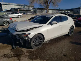 2020 Mazda Mazda3 Hatchback Premium Package with VIN JM1BPBNM9L1158444, listed as a Copart auction lot 49339575 with 93,329 mi miles and Salvage Title. Bid and sale history available at carsss.com. Image 1.