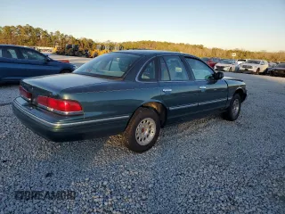 1996 Ford Crown Victoria LX z VIN 2FALP74W0TX205507, wystawiony jako Copart lot #85310874 z przebiegiem 51 646 mil mil oraz Szkoda całkowita • Salvage title. Historia ofert i sprzedaży dostępna na DreamBid. Obrazek 3.