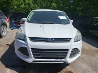 2016 Ford Escape SE z VIN 1FMCU9GX1GUC67851, wystawiony jako IAAI lot #42283011 z przebiegiem 134 458 mil mil oraz . Historia ofert i sprzedaży dostępna na DreamBid. Obrazek 12.