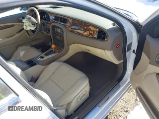 2005 Jaguar S-Type with VIN SAJWA01T75FN17656, listed as a IAAI auction lot 41282140 with 126,631 mi miles and . Bid and sale history available at DreamBid. Image 5.