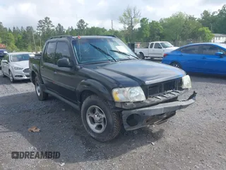 2005 Ford Explorer Sport Trac XLS z VIN 1FMZU67K55UA88299, wystawiony jako IAAI lot #42128186 z przebiegiem Nie podano mil oraz . Historia ofert i sprzedaży dostępna na DreamBid. Obrazek 1.