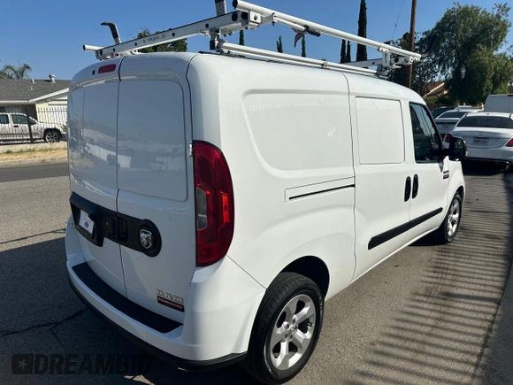 2022 Ram ProMaster City Cargo Tradesman with VIN ZFBHRFAB8N6W22817, listed as a Copart auction lot 66117855 with 34,878 mi miles and Salvage title. Bid and sale history available at DreamBid. Image 4.
