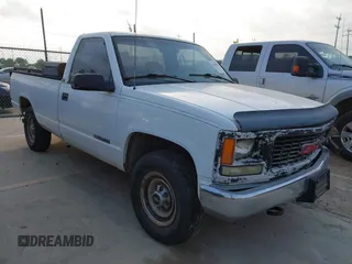 1996 GMC Sierra 1500 z VIN 1GTGC24R8TZ544336, wystawiony jako IAAI lot #42140259 z przebiegiem 315 491 mil mil oraz . Historia ofert i sprzedaży dostępna na DreamBid. Obrazek 1.