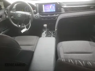 2025 Toyota Camry LE with VIN 4T1DAACKXSU043785, listed as a Copart auction lot 52207785 with 9,410 mi miles and Salvage Title. Bid and sale history available at DreamBid. Image 8.