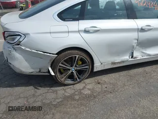 2019 BMW 4 Series 430i xDrive z VIN WBA4J3C55KBL08387, wystawiony jako IAAI lot #42248405 z przebiegiem 115 017 mil mil oraz . Historia ofert i sprzedaży dostępna na DreamBid. Obrazek 18.