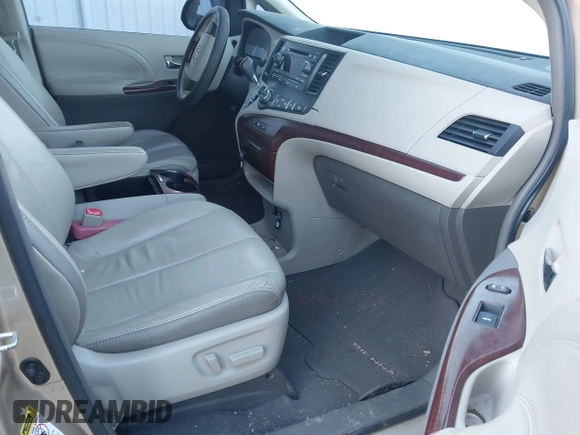2011 Toyota Sienna XLE AAS with VIN 5TDYK3DC3BS100192, listed as a IAAI auction lot 41874537 with 190,631 mi miles and . Bid and sale history available at DreamBid. Image 5.