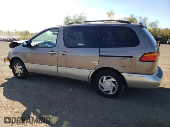1998 Toyota Sienna LE with VIN 4T3ZF13C5WU049992, listed as a Copart auction lot 74492774 with 174,751 mi miles and Salvage Title. Bid and sale history available at carsss.com. Image 2.