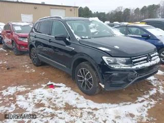 2021 Volkswagen Tiguan SE with VIN 3VV2B7AX6MM102379, listed as a IAAI auction lot 41613929 with 42,483 mi miles. Bid and sale history available at carsss.com. Image 1.