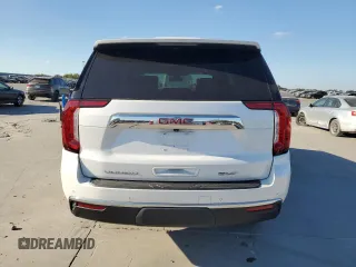 2022 GMC Yukon SLT with VIN 1GKS1BKD1NR259041, listed as a Copart auction lot 77877304 with 27,772 mi miles and Salvage Title. Bid and sale history available at carsss.com. Image 6.
