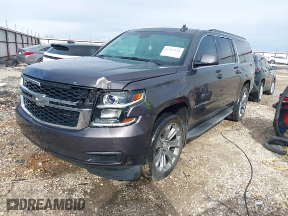 2015 Chevrolet Suburban LT with VIN 1GNSKJKC8FR717435, listed as a IAAI auction lot 41313726 with 120,731 mi miles and . Bid and sale history available at DreamBid. Image 17.
