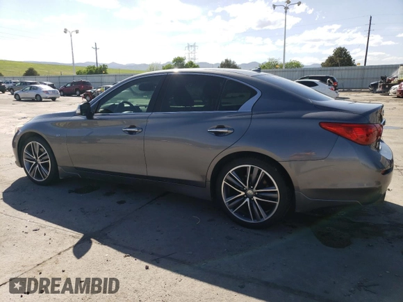 2015 Infiniti Q50 Premium z VIN JN1BV7AR6FM401105, wystawiony jako Copart lot #56982265 z przebiegiem 108 256 mil mil oraz Czysty tytuł • Clean title. Historia ofert i sprzedaży dostępna na DreamBid. Obrazek 2.