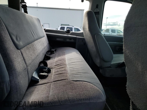 2006 Ford Econoline Passenger XL with VIN 1FBNE31L96HA61105, listed as a Copart auction lot 51996365 with 306,164 mi miles and Salvage title. Bid and sale history available at DreamBid. Image 11.