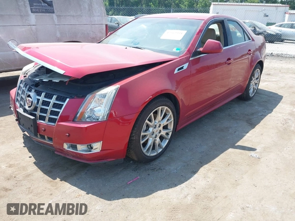 2012 Cadillac CTS Premium with VIN 1G6DS5E34C0132696, listed as a IAAI auction lot 42562931 with 83,025 mi miles and . Bid and sale history available at DreamBid. Image 2.