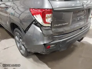 2019 Honda Passport Touring with VIN 5FNYF8H98KB007933, listed as a IAAI auction lot 41953263 with 87,614 mi miles. Bid and sale history available at carsss.com. Image 6.