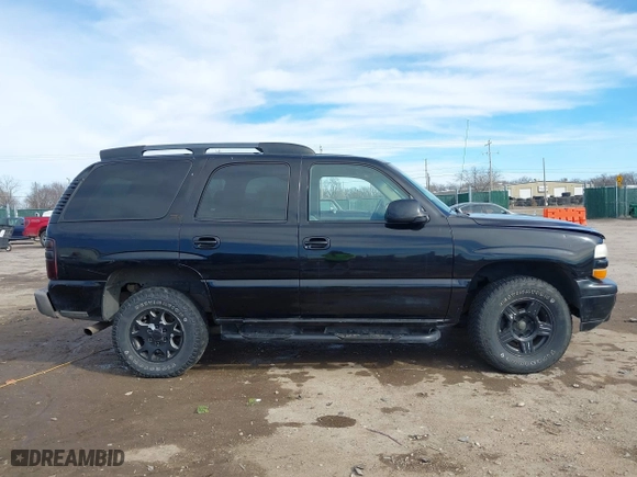 2001 Chevrolet Tahoe LS with VIN 1GNEK13T41R219642, listed as a IAAI auction lot 41655081 with 243,737 mi miles. Bid and sale history available at carsss.com. Image 13.
