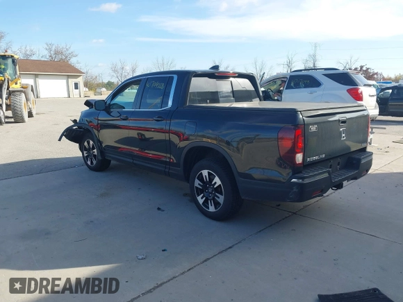 2020 Honda Ridgeline RTL with VIN 5FPYK3F59LB023212, listed as a IAAI auction lot 40704228 with 73,259 mi miles and . Bid and sale history available at DreamBid. Image 3.